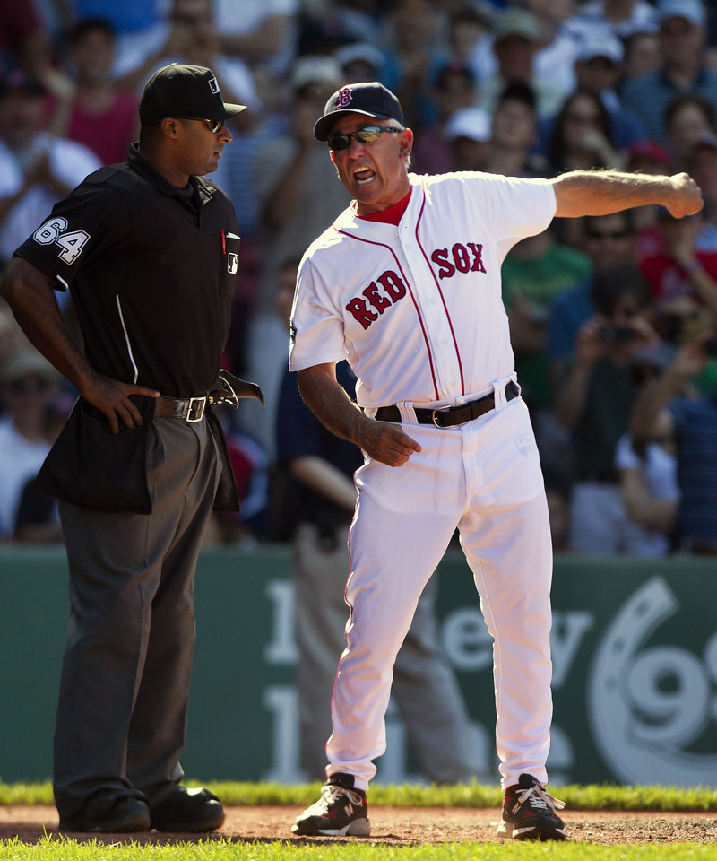 Red Sox Manager Bobby Valentine argues with home plate umpire Al Porter in the ninth inning Sunday. Valentine was thrown out for arguing balls and strikes.