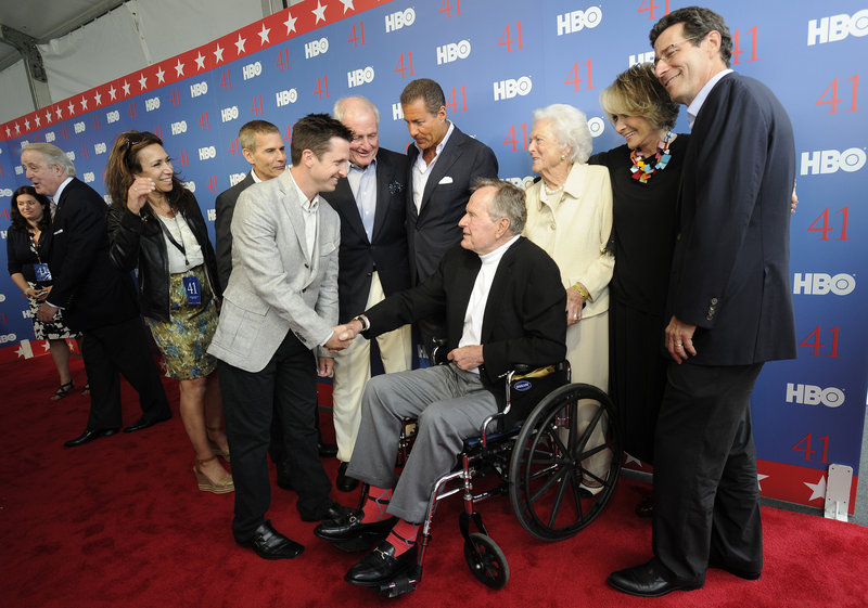 Jeffrey Roth, the director of the HBO documentary “41,” greets the former president as George and Barbara Bush arrive for a special early screening of the film, which Bush narrates.