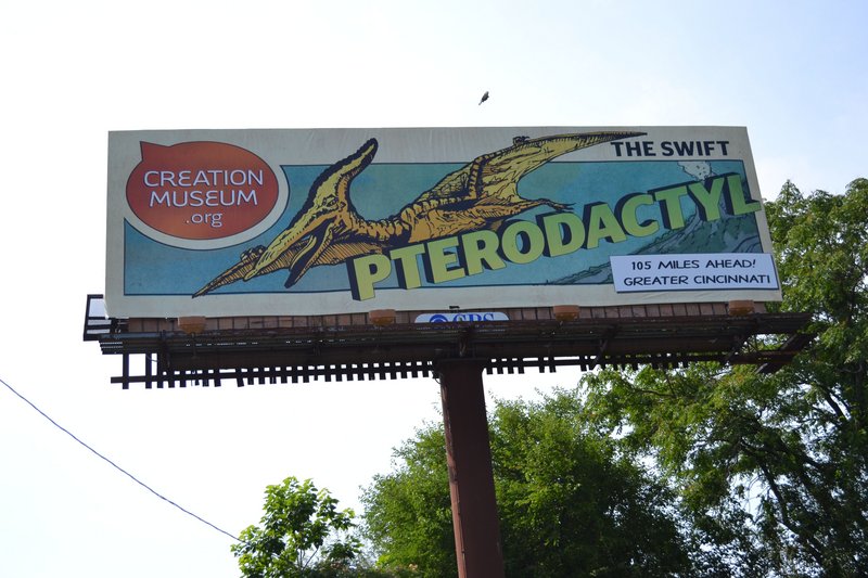 A billboard in Louisville, Ky., uses a flying pterodactyl to promote the Creation Museum near Cincinnati. The billboards are part of a major ad campaign to get people to the museum.