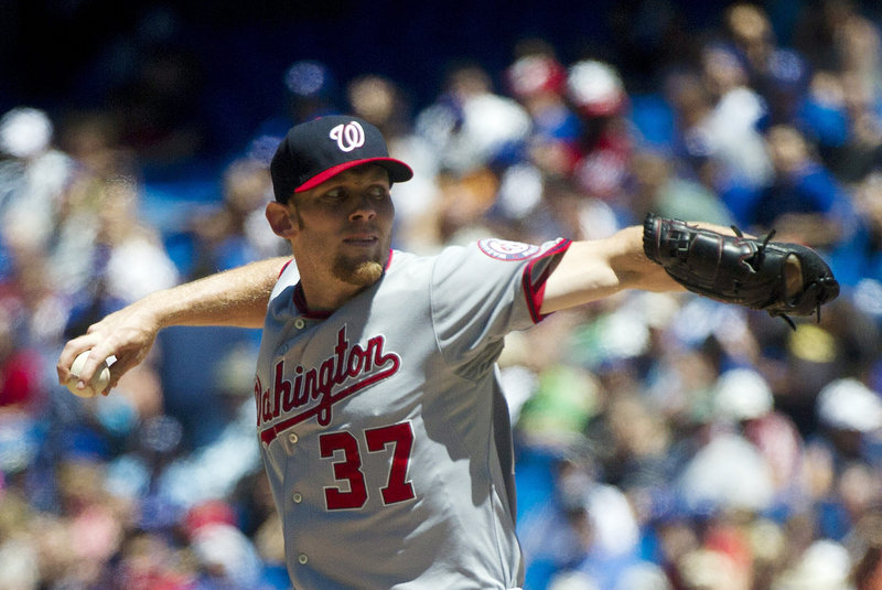Stephen Strasburg of the Nationals throws a pitch during a 6-2 win at Toronto on Wednesday. Strasburg (8-1) won his fifth straight decision, striking out eight in six innings.