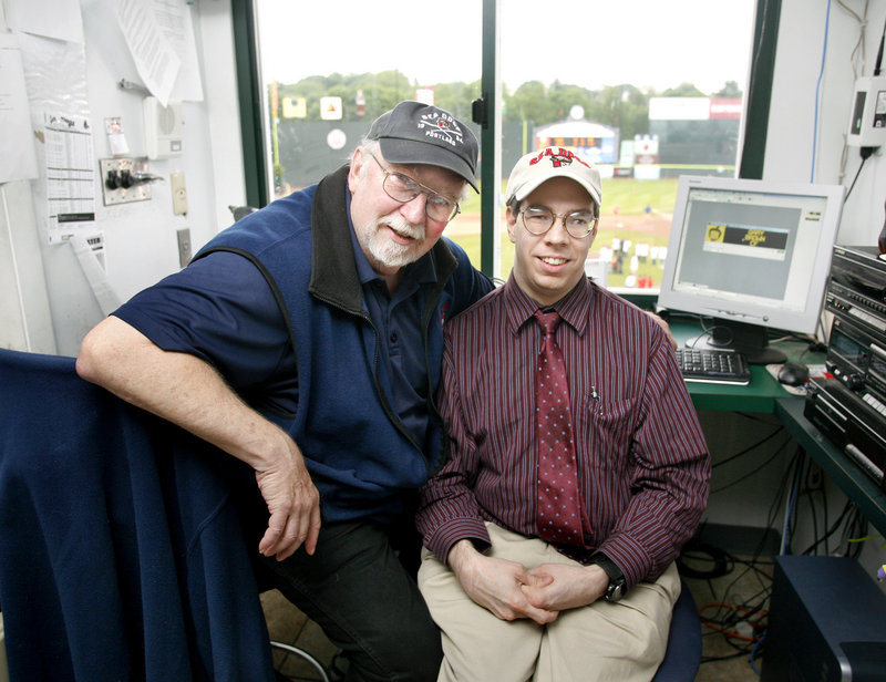 Dean Rogers, left, has been the Sea Dogs’ public address announcer since the team’s birth in 1994, and his son, Mark, operates the message board at Hadlock Field.