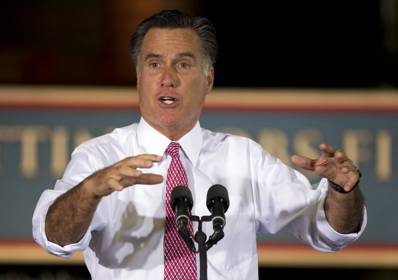 Republican presidential candidate Mitt Romney gestures during a campaign stop at Seilkop Industries in Cincinnati, Ohio, on Thursday.