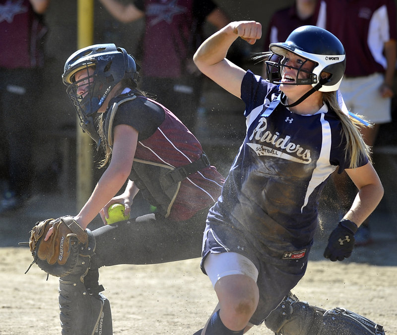Maggie McConkey celebrates after scoring Fryeburg’s first run Thursday, starting an eight-run rally in the fourth inning that gave the Rangers an 8-1 win over Greely.