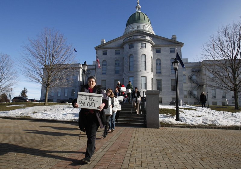 Same-sex marriage backers carry signed petitions to the Maine Secretary of State’s Office on Jan. 26. A Lyman Catholic says he’s proud that the Maine diocese won’t be participating in a “second collection” Sunday to fund efforts to thwart gay marriage.