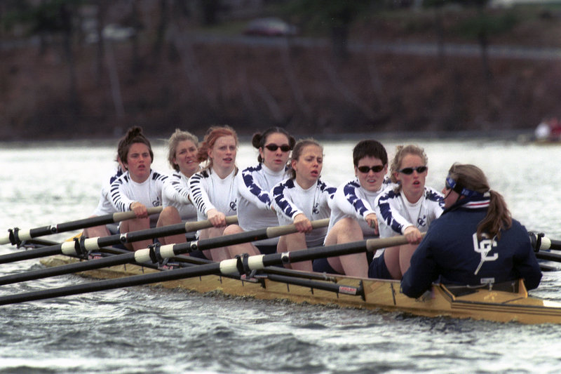 Julia Pitney (then Julia Greenleaf), fourth from back, rows with the Connecticut College women’s crew team in April 1999. That fall, after their coach stepped down and was replaced by one with little experience, the team staged a sit-in.