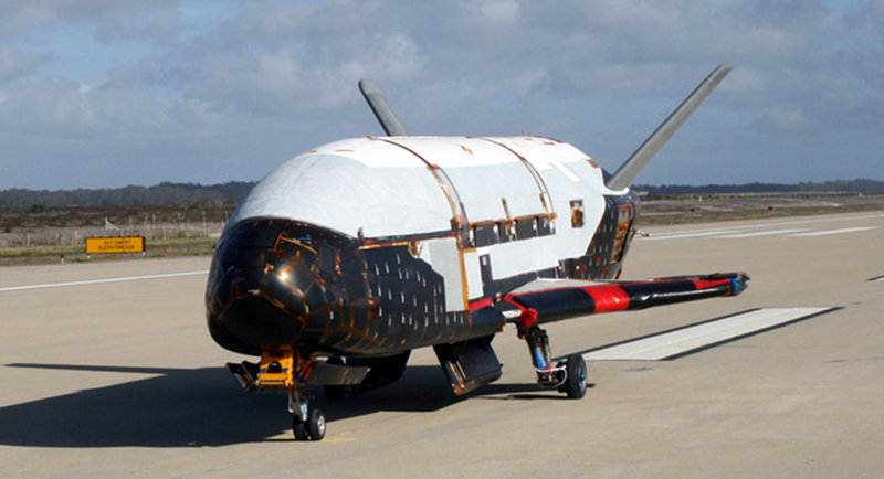 This image, provided by the Air Force, shows the X-37B spacecraft. The unmanned Air Force space plane steered itself to a landing early Saturday at a California military base, capping a 15-month clandestine mission.