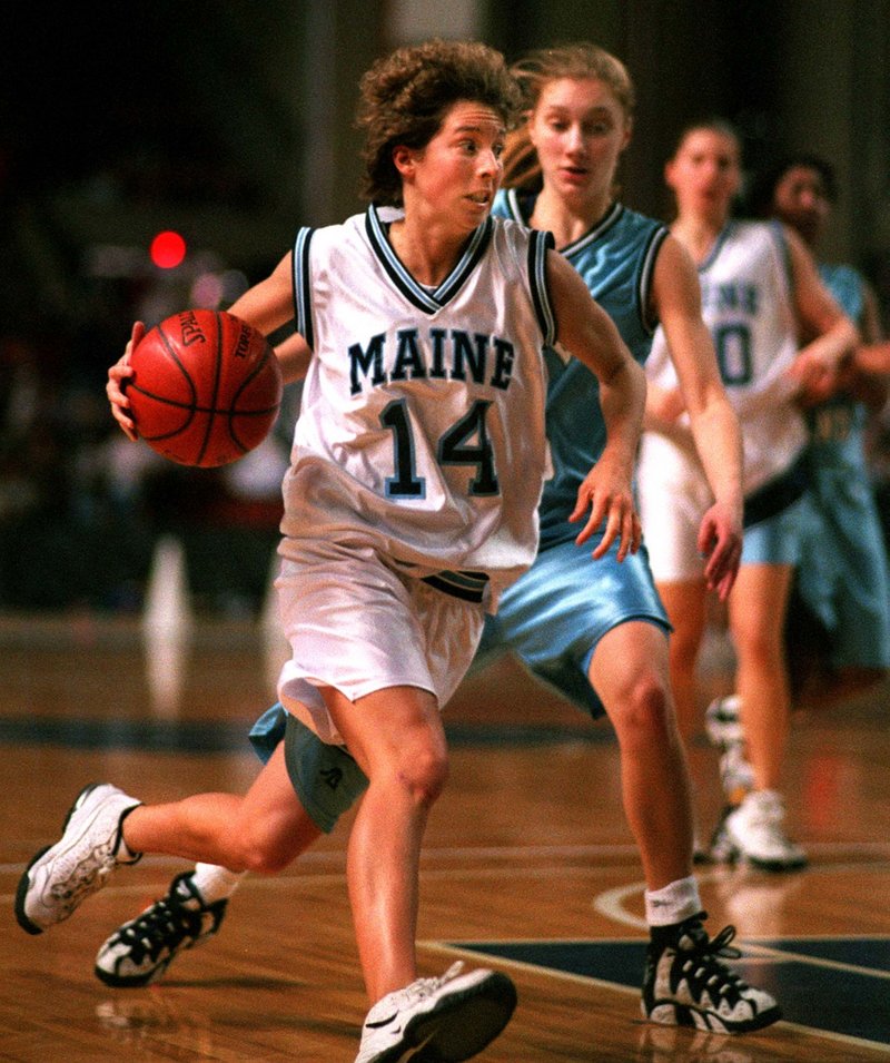 UMO’s Cindy Blodgett drives to the basket in 1996, showing why children at the time wore her No. 14 replica jersey.