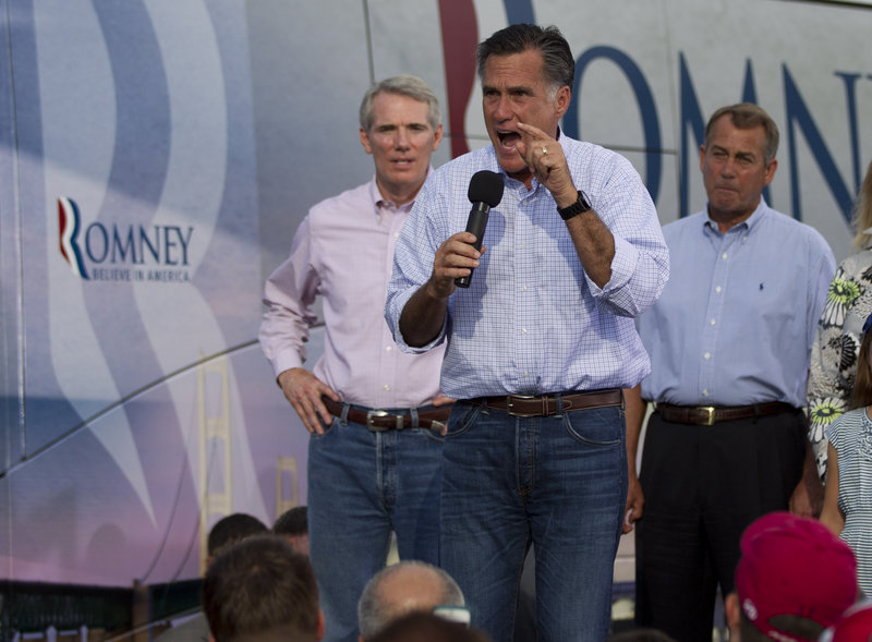 Republican presidential candidate Mitt Romney speaks at a campaign stop in Troy, Ohio, on Sunday.