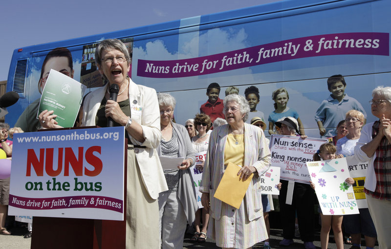 Sister Simone Campbell, executive director of Network, speaks during a stop on the first day of a nine-state Nuns on the Bus tour, on Monday in Ames, Iowa.