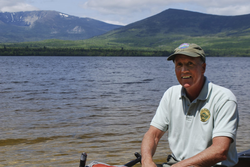 Jensen Bissell, the Baxter State Park director, is in the process of surveying and considering the land at Painters’ Beach on Katahdin Lake that looks to Mount Katahdin.