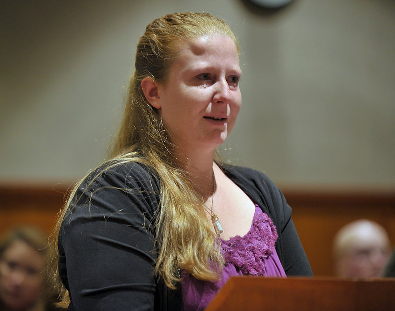 Carly Downs, daughter of beating victim Roger Downs Jr., addresses the court during the sentencing of Ernest Weidul in Cumberland County Unified Court on Tuesday.