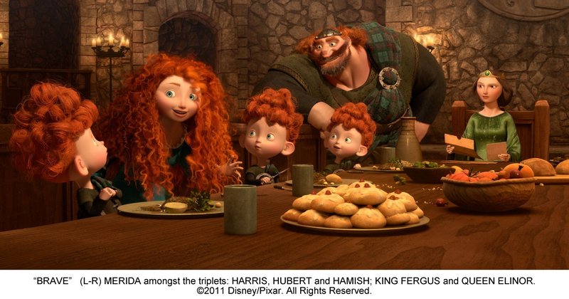 Merida sits among the triplets Harris, Hubert and Hamish, with King Fergus, voiced by Billy Connolly.