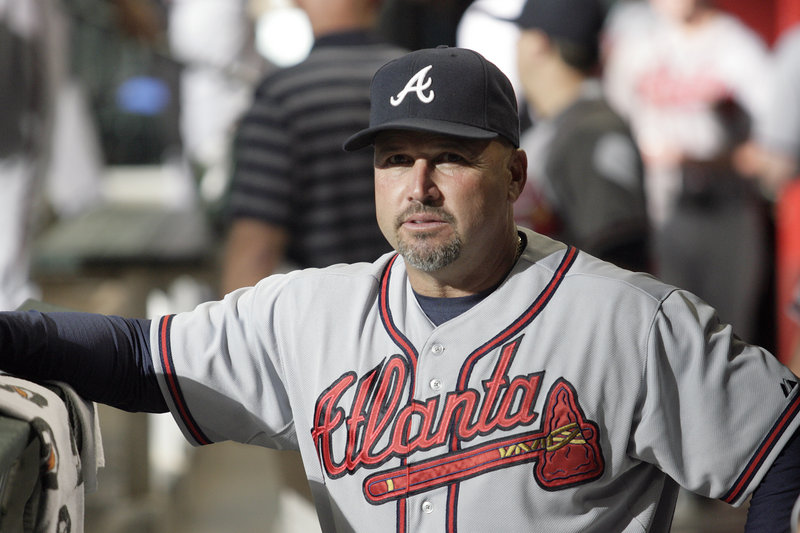 Fredi Gonzalez, manager of the Atlanta Braves, in 1996 followed Carlos Tosca as manager of the Portland Sea Dogs. Now Tosca is his bench coach in Atlanta.