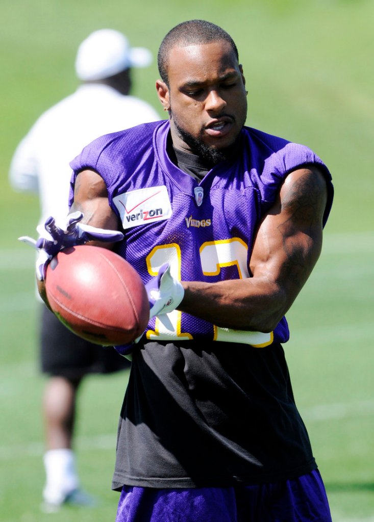 Vikings receiver Percy Harvin was back on the field Thursday, a day after he skipped a mandatory practice session and demanded a trade.