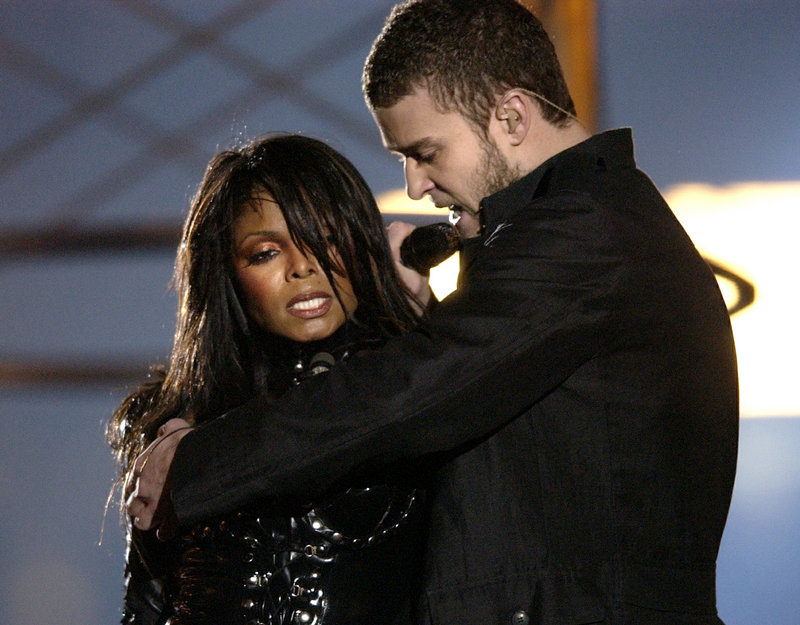In this 2004 photo, Justin Timberlake and Janet Jackson sing at the Super Bowl, just before he pulled off the covering to her right breast, which was partially exposed.