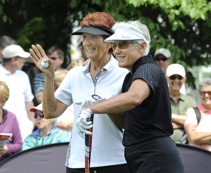 Donna Caponi, left, and Patty Sheehan enjoy a light moment before the start of play Saturday. Caponi finished with an 82 while Sheehan had a 76.