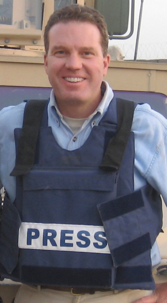 This picture, taken in 2007 and released Saturday, shows Greg Burke as a Fox News journalist in Afghanistan. Burke, 52, will leave Fox to become a senior communications adviser in the Vatican's secretariat of state, the Vatican and Burke told The Associated Press.
