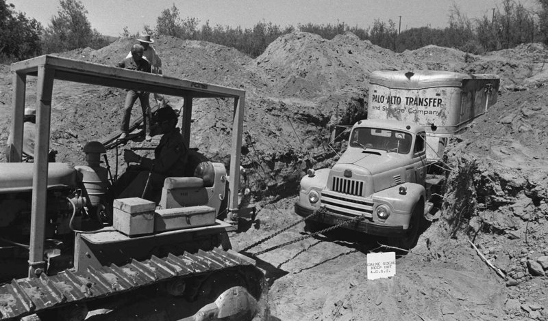 On July 20, 1976, officials remove a furniture van buried at a Livermore, Calif., quarry, in which 26 schoolchildren and their bus driver were held captive. They escaped unharmed. One of three men convicted in the case has been freed from prison.