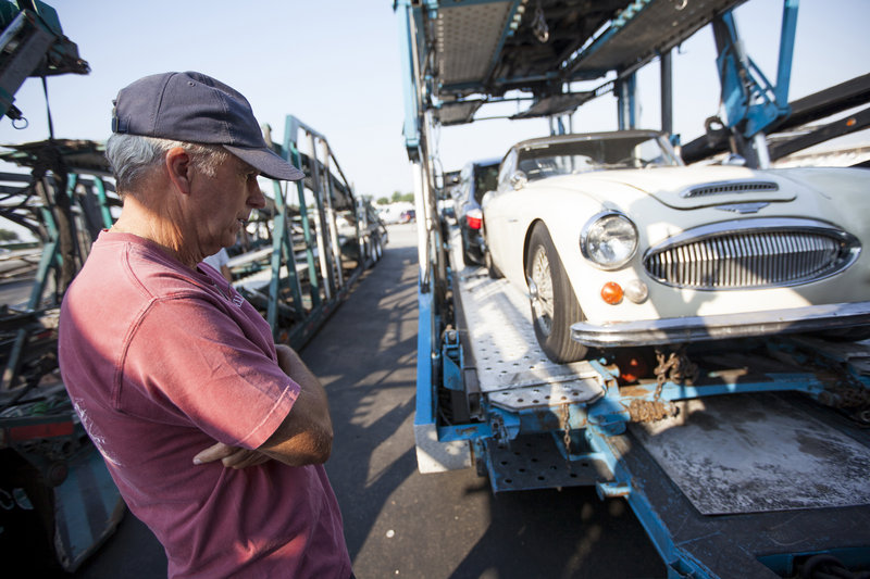 Bob Russell inspects his 1967 Austin Healey in Dallas on Saturday before the final leg of the vehicle’s trip from California to Russell’s home in Southlake, Texas.