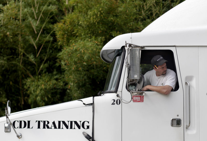 Robert Luckado practices a 45-degree backup maneuver during a skills class at the Carolina Trucking Academy training school in Raleigh, N.C., earlier this month.