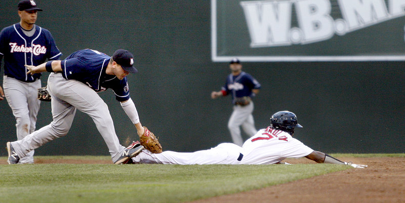 Jackie Bradley Jr. of the Sea Dogs is tagged out by Mark Sobolewski of New Hampshire after oversliding second base and getting caught in a rundown in the third inning.