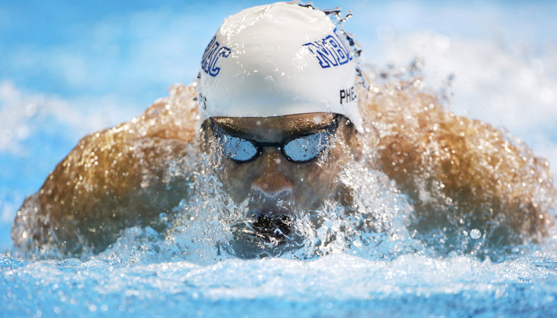 Michael Phelps swims in the men’s 200-meter butterfly semifinal at the U.S. Olympic trials in Omaha, Neb. Wednesday. Phelps earlier beat Ryan Lochte in the 200-meter freestyle final.