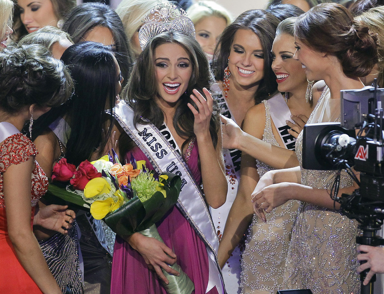 Miss Rhode Island Olivia Culpo, center, is surrounded by fellow contestants after being crowned Miss USA during the 2012 Miss USA pageant Sunday in Las Vegas.