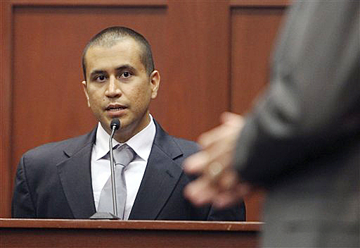 George Zimmerman, left, answers a question from attorney Mark O'Mara during a bond hearing in Sanford, Fla., in this April 20, 2012, photo,