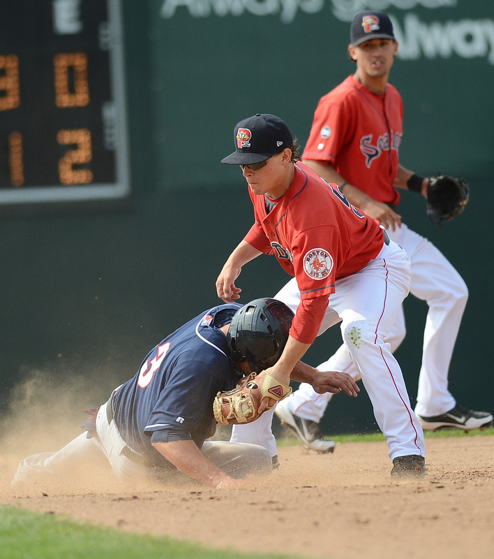John Tolisano of the Fisher Cats beats the tag by Portland’s Zach Gentile to steal second in Sunday’s game at Hadlock Field. New Hampshire won the final game of the five-game series, 5-1.