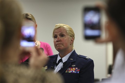 Staff Judge Advocate Col. Polly Kenny holds a news conference before the start of the court-martial of U.S. Air Force Staff Sgt. Luis A. Walker at Lackland Air Force Base, Monday, July 16, 2012 in San Antonio. Walker, a former training officer, is charges with illicit sexual contact with 10 female trainees. He is facing 28 counts including rape and is one of 12 instructors under investigation. (AP Photo/The San Antonio Express-News, Jerry Lara)