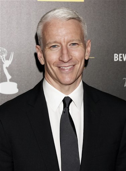 This June 23, 2012 file photo shows CNN's Anderson Cooper arrives at the 39th Annual Daytime Emmy Awards at the Beverly Hilton Hotel in Beverly Hills, Calif. Cooper came out in a letter online, saying "the fact is, I'm gay." He said Monday, July 2, in a note to the Daily Beast's Andrew Sullivan that he had kept his sexual orientation private for personal and professional reasons, but came to think that remaining silent had given some people an impression that he was ashamed. (Photo by Todd Williamson/Invision/AP, file)