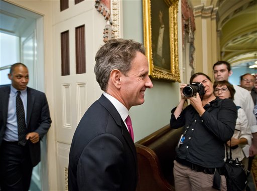 Treasury Secretary Timothy Geithner leaves a closed-door meeting with Senate Democrats on Capitol Hill in Washington, in this July 10, 2012, photo.