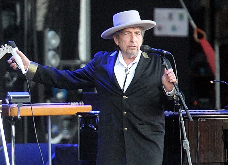 This July 22, 2012 file photo shows U.S. singer-songwriter Bob Dylan performing on at "Les Vieilles Charrues" Festival in Carhaix, western France. A staff writer for The New Yorker has resigned and his latest book has been halted after he acknowledged inventing quotes by Bob Dylan. Jonah Lehrer released a statement Monday, July 30, through his publisher, Houghton Mifflin Harcourt, that some Dylan quotes appearing in his book "Imagine: How Creativity Works" did "not exist." Others were "unintentional misquotations, or represented improper combinations of previously existing quotes." (AP Photo/David Vincent, file)