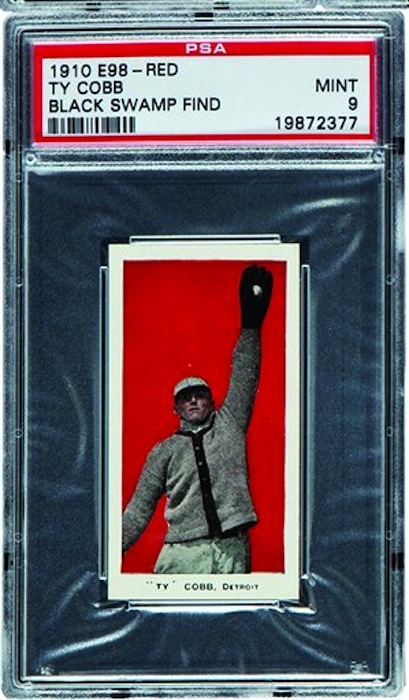 This undated photo provided by Heritage Auctions of Dallas, shows a 1910 E98 Ty Cobb baseball card found in the attic of a house in Defiance, Ohio with about 700 others. The best of the bunch – 37 cards – are expected to bring a total of $500,000 when they are sold at auction in August during the National Sports Collectors Convention in Baltimore. (AP Photo/ Heritage Auctions)