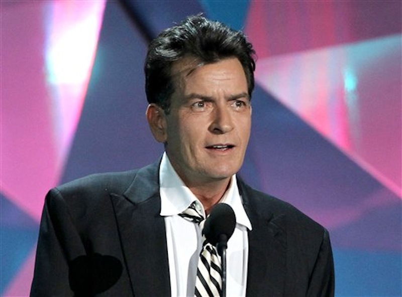 This June 3, 2012 file photo shows actor Charlie Sheen at the MTV Movie Awards in Los Angeles. In an interview Tuesday, July 17, on Ryan Seacrest's radio show, Sheen said ìAmerican Idolî producer Nigel Lythgoe publicly threw his name out there as a possible judge and the idea peaked his interest. Sheen told Jay Leno Monday night on ìThe Tonight Showî that his two demands would be that FX and his ìAnger Managementî team ìwould have to be into itî and there would need to be a charitable component to him taking the job. (Photo by Matt Sayles/Invision/AP, file)