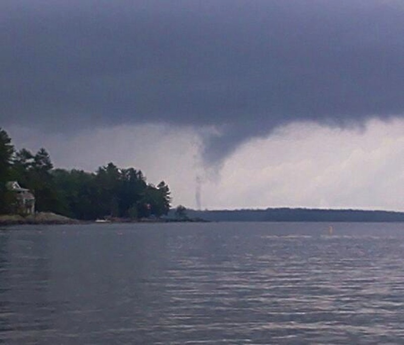 A funnel cloud forms over Sebago Lake on Sunday. The National Weather Service said if the funnel cloud had touched down on land and caused property damage it likely would have been classified as a tornado.