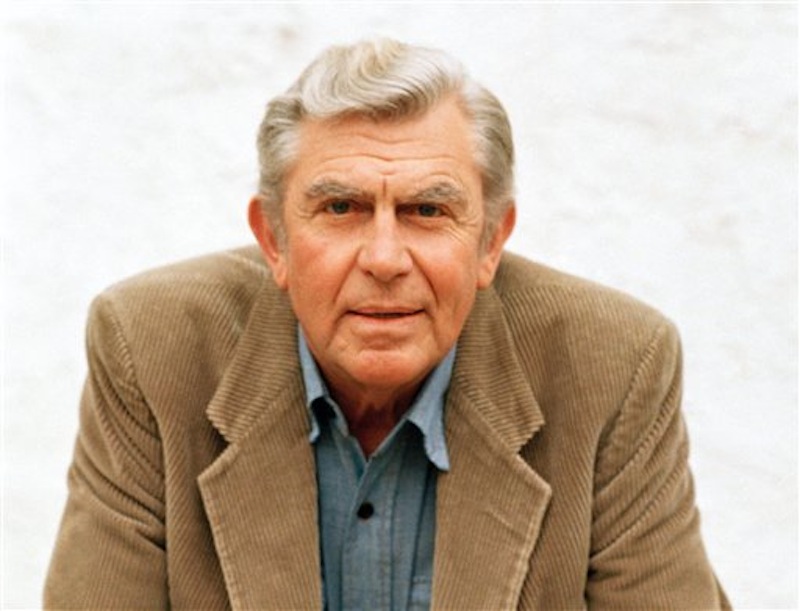 This March 6, 1987 file photo shows actor Andy Griffith in Toluca Lake, Calif. Griffith, whose homespun mix of humor and wisdom made "The Andy Griffith Show" an enduring TV favorite, died Tuesday, July 3, 2012. He was 86. (AP Photo/Doug Pizac, file) Actor;celebrity;hands;folded;posing
