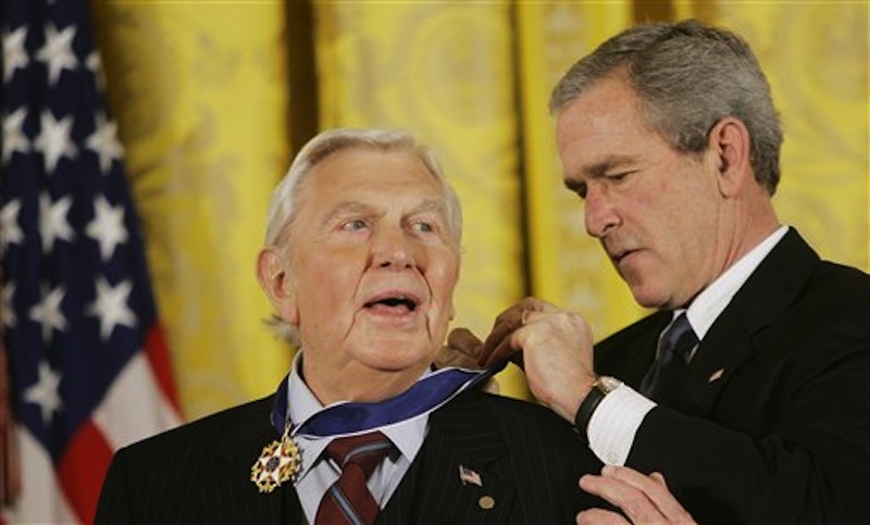 This Nov. 9, 2005 file photo shows President Bush presenting the Presidential Medal of Freedom to actor Andy Griffith in the East Room of the White House. Griffith, whose homespun mix of humor and wisdom made "The Andy Griffith Show" an enduring TV favorite, died Tuesday, July 3, 2012 in Manteo, N.C. He was 86. (AP Photo/Evan Vucci, file)