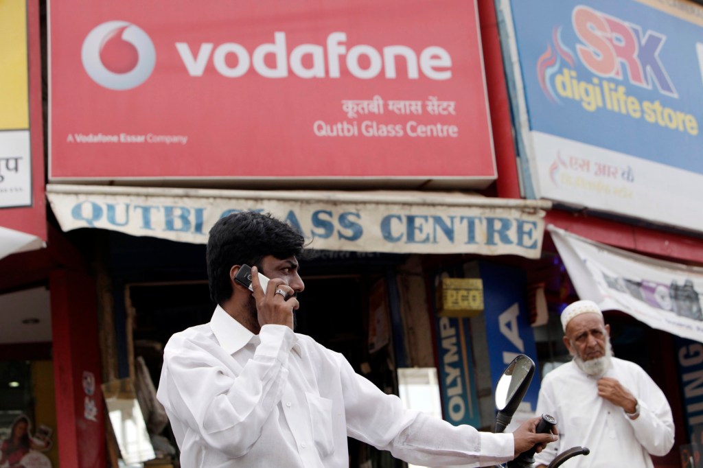 Indian wireless carriers are offering money transfer services in a nation where mobile phone connections outnumber bank accounts.