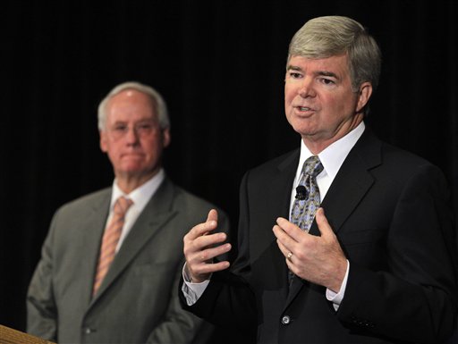 NCAA President Mark Emmert, right, and Ed Ray, NCAA Executive Committee chair and Oregon State University president, announce penalties against Penn State at a news conference Monday in Indianapolis in the wake of the Jerry Sandusky child sex abuse scandal.