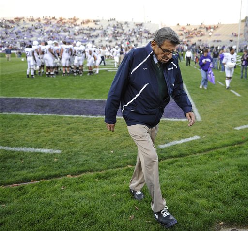 Penn State coach Joe Paterno walks off the field after warmups before Penn State's game against Northwestern in Evanston, Ill., in this Oct. 22, 2011, photo.