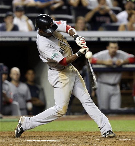 Pedro Ciriaco singles to drive in the winning run for the Red Sox in the 10th inning against the Yankees on Sunday at Yankee Stadium in New York.
