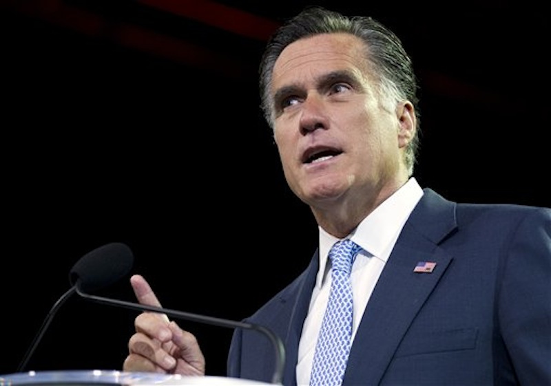 In this July 11, 2012 file photo, Republican presidential candidate, former Massachusetts Gov. Mitt Romney speaks in Houston, Texas. Federal documents filed by Romney's former company appear to conflict with the Republican presidential candidate's statements about when he left Bain Capital, and the Obama campaign says Romney either committed a crime or lied to the American people. (AP Photo/Evan Vucci, File)
