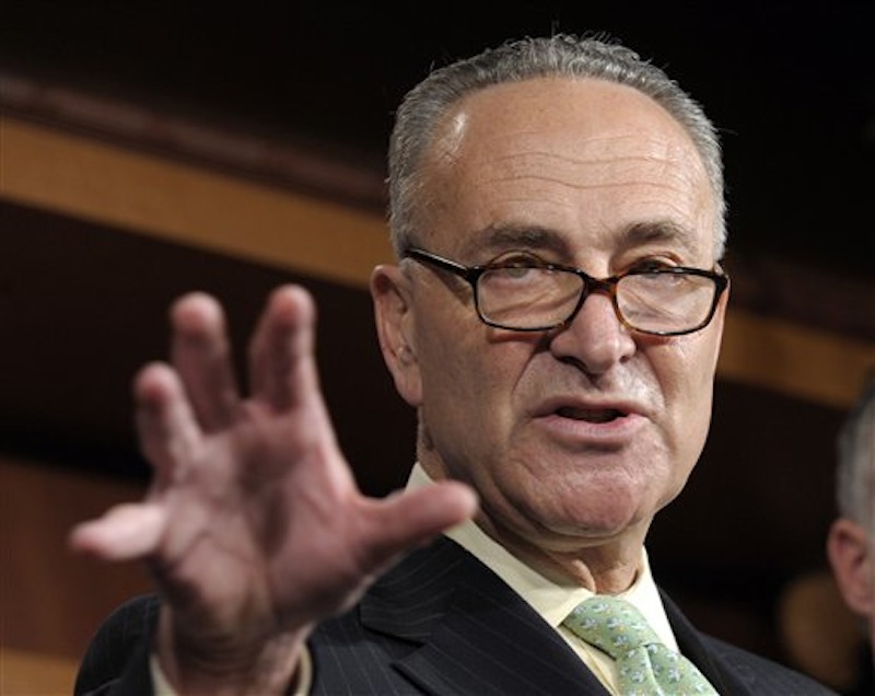 In this May 17, 2012 file photo, Sen. Charles Schumer, D-N.Y. gestures during a news conference on Capitol Hill in Washington. Democrats want to push tax cuts through the Senate for companies that hire new workers, give raises or buy major new equipment this year. With neither party eager to let the other claim campaign-season victories, the ultimate fate of the roughly $29 billion legislation seems dubious. Debate was to begin Tuesday, though it was possible Republicans would use procedural blockades to quickly derail the measure. (AP Photo/Susan Walsh, File)