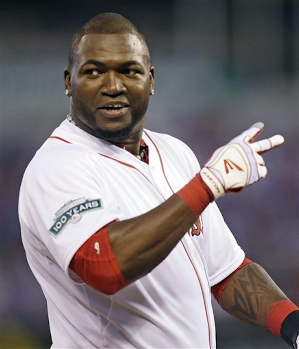 American League's David Ortiz, of the Boston Red Sox, jokes with fans during the fifth inning of the MLB All-Star baseball game against the National League, Tuesday, July 10, 2012, in Kansas City, Mo. The last-place Red Sox are hoping for better health in second half of the season. (AP Photo/Jeff Roberson)