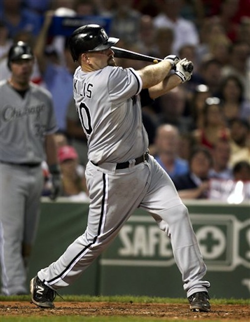 Chicago White Sox's Kevin Youkilis hits a three-run home run off a pitch by Boston Red Sox's Jon Lester in the fourth inning of a baseball game in Boston, Tuesday, July 17, 2012. (AP Photo/Steven Senne)