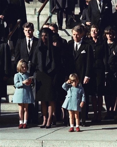 This Nov. 25, 1963 file photo shows three-year-old John F. Kennedy Jr. saluting his father's casket in Washington on Nov. 25, 1963, three days after the president was assassinated in Dallas. Widow Jacqueline Kennedy, center, and daughter Caroline Kennedy are accompanied by the late president's brothers Sen. Edward Kennedy, left, and Attorney General Robert Kennedy. Sony Electronics and the Nielsen television research company collaborated on a survey ranking TV's most memorable moments. Other TV events include, the Sept. 11 attacks in 2001, Hurricane Katrina in 2005, the O.J. Simpson murder trial verdict in 1995 and the death of Osama bin Laden in 2011. (AP Photo, file)
