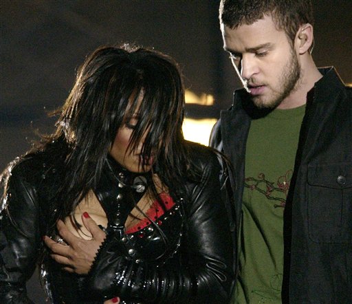 In this Sunday Feb. 1, 2004 file photo, entertainer Janet Jackson, left, covers her breast after her outfit came undone during the half time performance with Justin Timberlake at Super Bowl XXXVIII in Houston. Sony Electronics and the Nielsen television research company collaborated on a survey ranking TV's most memorable moments. Other TV events include, the Sept. 11 attacks in 2001, Hurricane Katrina in 2005, the O.J. Simpson murder trial verdict in 1995 and the death of Osama bin Laden in 2011.(AP Photo/David Phillip, File) super;bowl;entertainment;halftime;superbowlentertainment