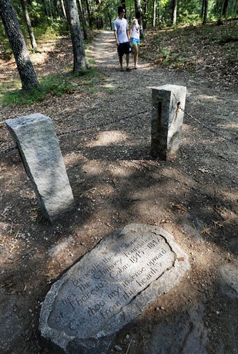 A stone inscription marks the actual site of Henry David Thoreau's cabin on the shores of Walden Pond in Concord, Mass. Members of the Thoreau Society gathered in Concord today for the third day of their annual gathering in honor of the naturalist and author.