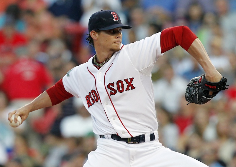 Boston Red Sox's Clay Buchholz pitches in the first inning of a baseball game against the Detroit Tigers in Boston, Monday, July 30, 2012. (AP Photo/Michael Dwyer)